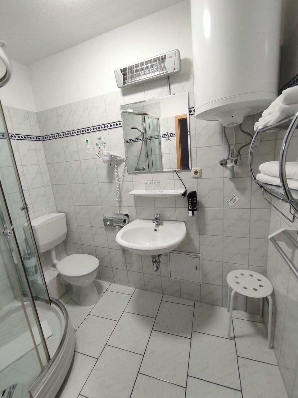 Double Room | Bathroom | Shower, hair dryer, towels, soap