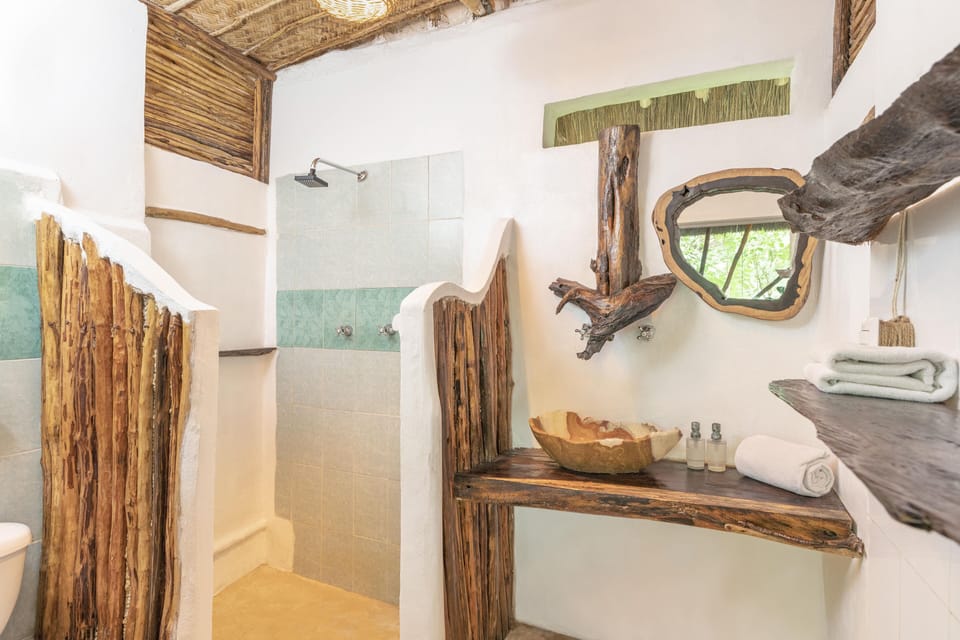 Quadruple Room | Bathroom | Shower, towels