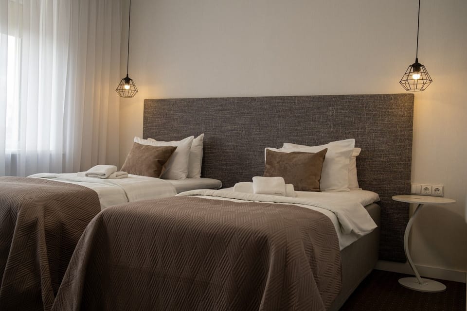Family Room, Non Smoking | In-room safe, blackout drapes, WiFi (free), bed sheets