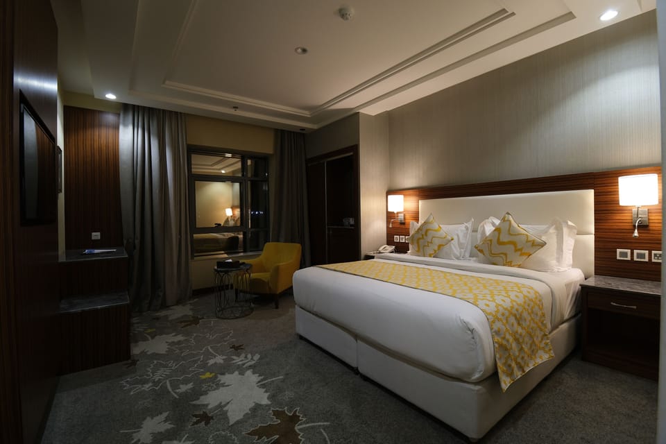 Basic Single Room | Free minibar, in-room safe, iron/ironing board, free WiFi