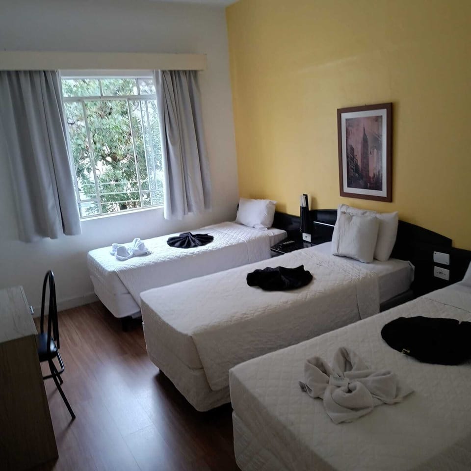 Standard Triple Room, 3 Twin Beds | Blackout drapes, iron/ironing board, free WiFi, bed sheets