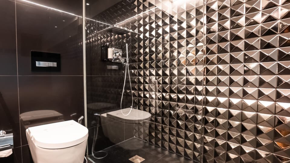 Suite | Bathroom | Hair dryer, slippers, towels, soap