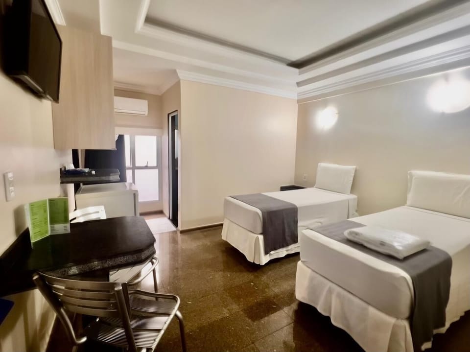 Economy Twin Room | Minibar, WiFi (free), bed sheets
