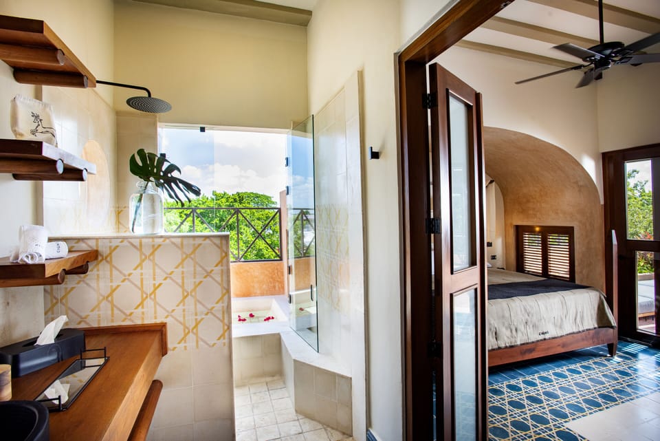Premium Suite, 1 King Bed, Terrace | Bathroom | Hair dryer, bathrobes, towels, soap