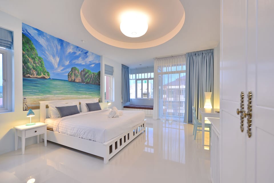 Deluxe Double Room | In-room safe, individually decorated, desk, blackout drapes