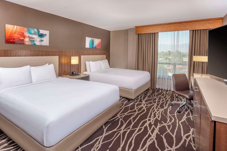 Hypo-allergenic bedding, in-room safe, desk, laptop workspace