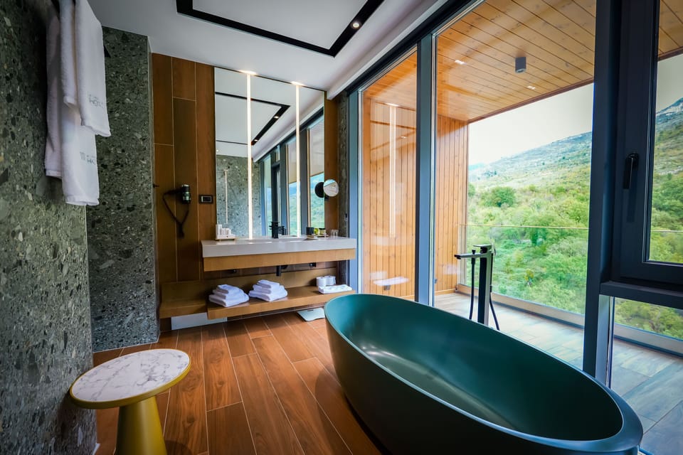 Suite | Bathroom | Hair dryer, slippers, bidet, towels