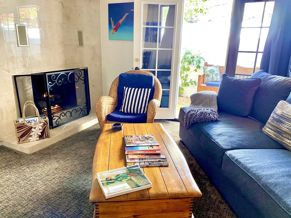 Premier Suite, 1 Bedroom, Fireplace | Living area | 32-inch TV with cable channels