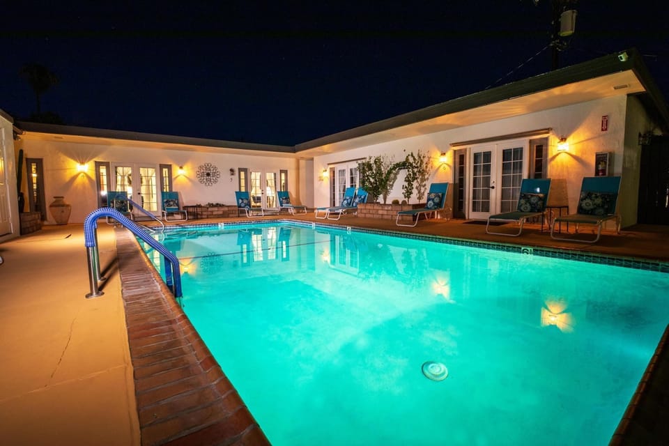 Outdoor pool, pool umbrellas, sun loungers