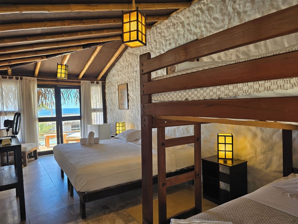 Standard Quadruple Room, Partial Ocean View | Bed sheets