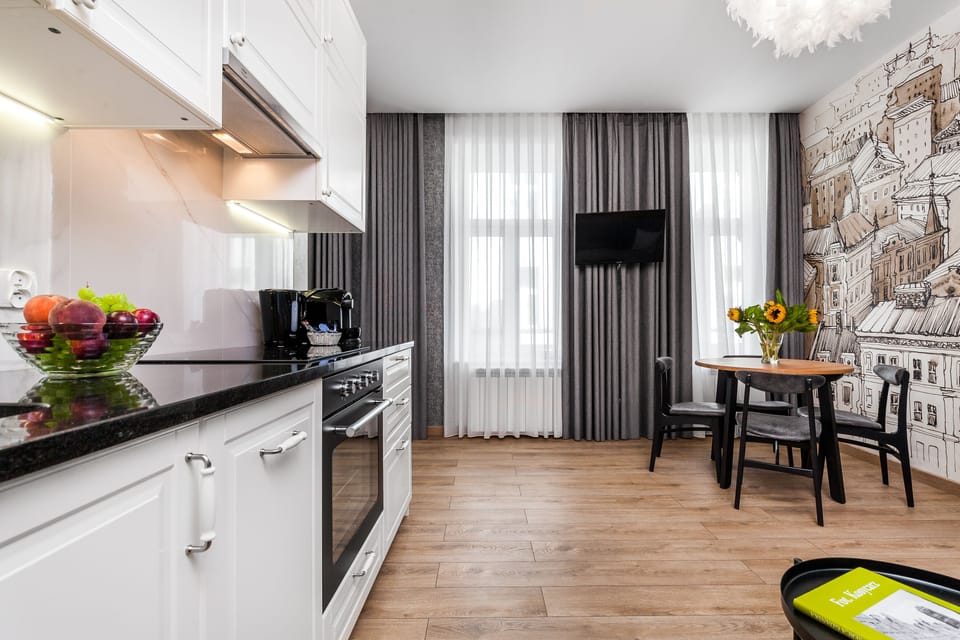 Comfort Apartment | Living area | 42-inch flat-screen TV with cable channels, TV