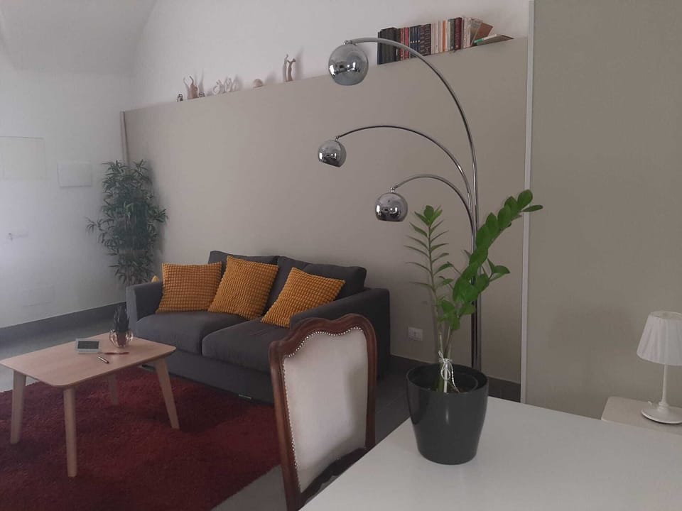 Luxury Studio Suite | Living area | 32-inch LCD TV with digital channels, TV