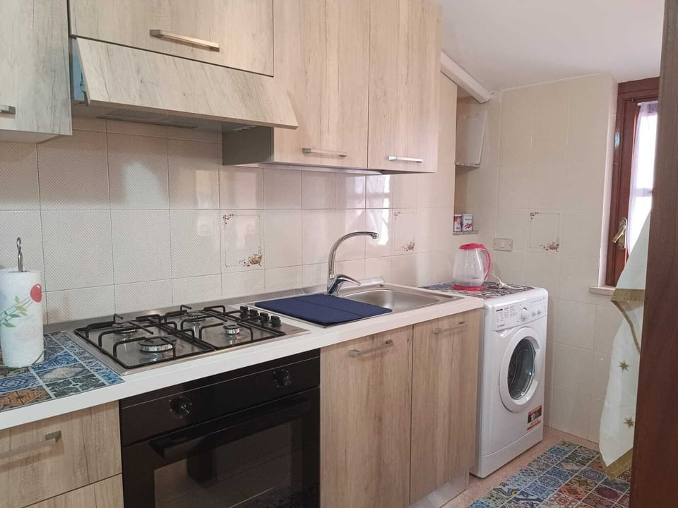 Apartment | Private kitchen | Full-size fridge, microwave, oven, stovetop