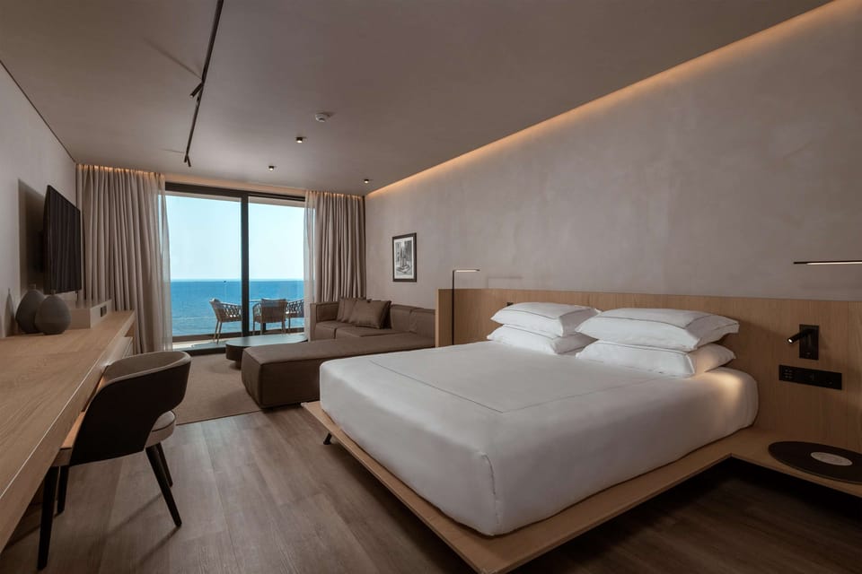 Open Plan Suite Sea View | In-room safe, desk, blackout drapes, soundproofing