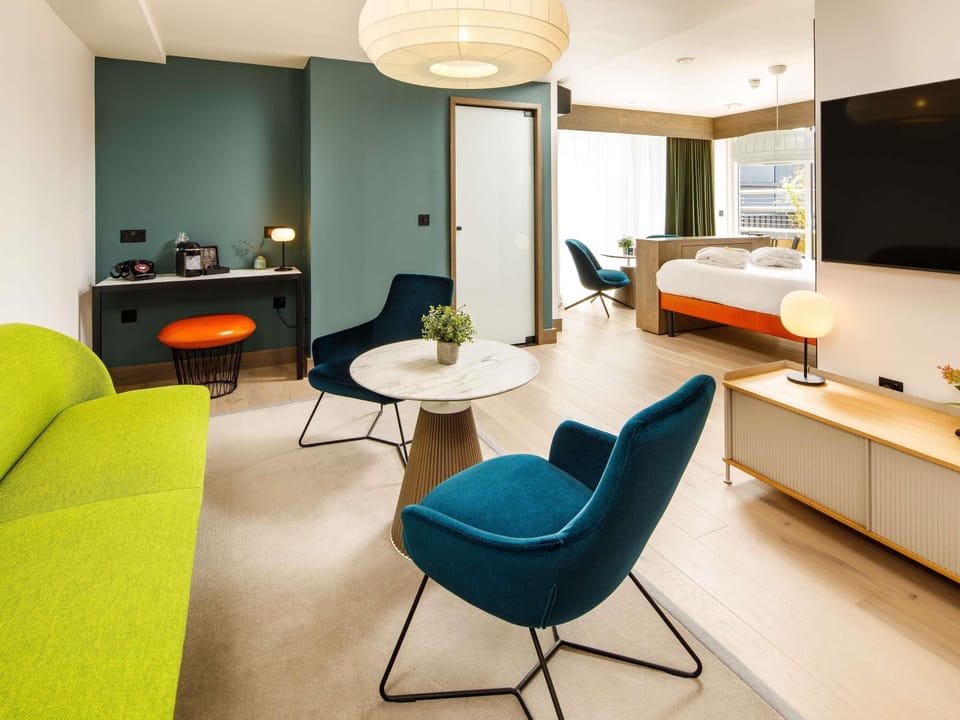 Junior Suite, 1 Double Bed, Balcony | In-room safe, desk, soundproofing, iron/ironing board