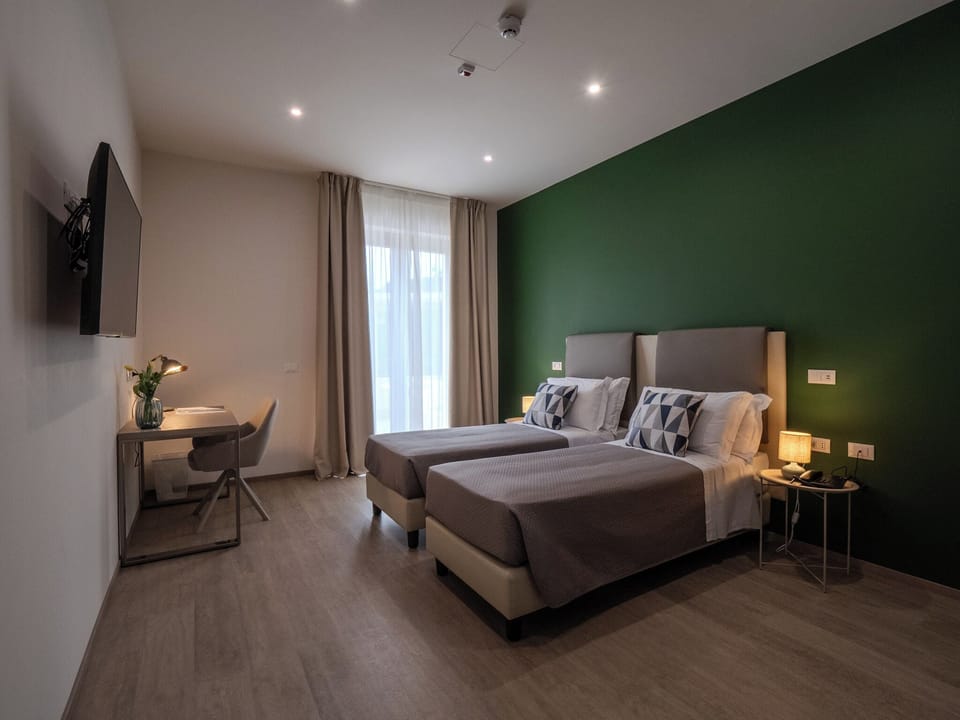 Superior Room | In-room safe, desk, laptop workspace, blackout drapes