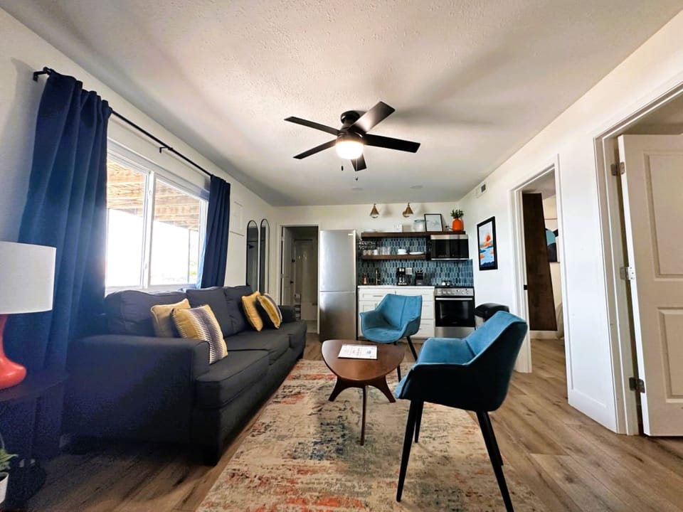 Family Suite | Living area | 45-inch flat-screen TV with cable channels