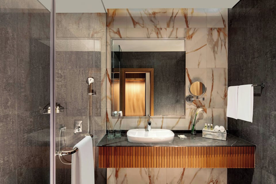 Eco-friendly toiletries, hair dryer, bathrobes, slippers