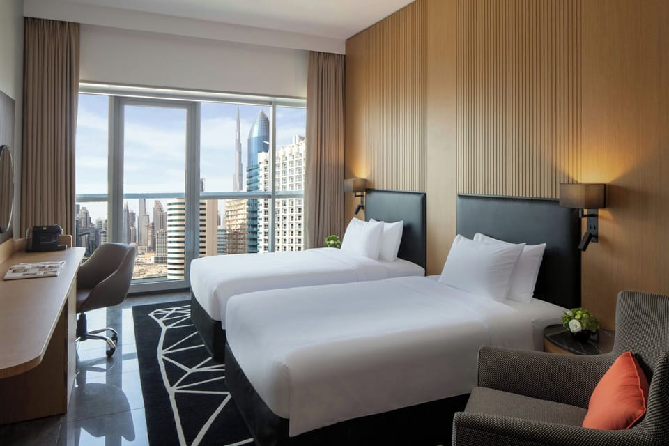 Superior Twin Room with City View and Soluna Access | Down comforters, in-room safe, desk, laptop workspace