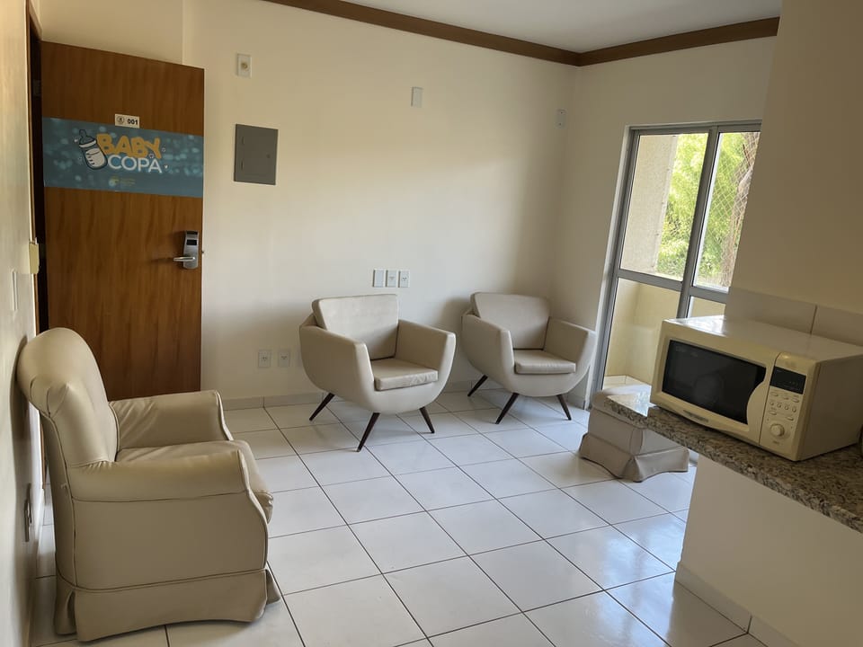 Classic Triple Room, 1 Bedroom, Non Smoking, Pool View | Living area | 32-inch flat-screen TV with satellite channels, TV, offices