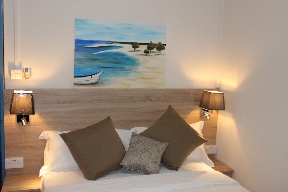 Hypo-allergenic bedding available, minibar, in-room safe, desk
