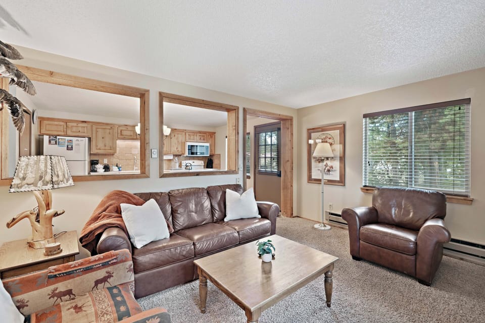 Townhome | Living area | 42-inch flat-screen TV with satellite channels, TV, fireplace