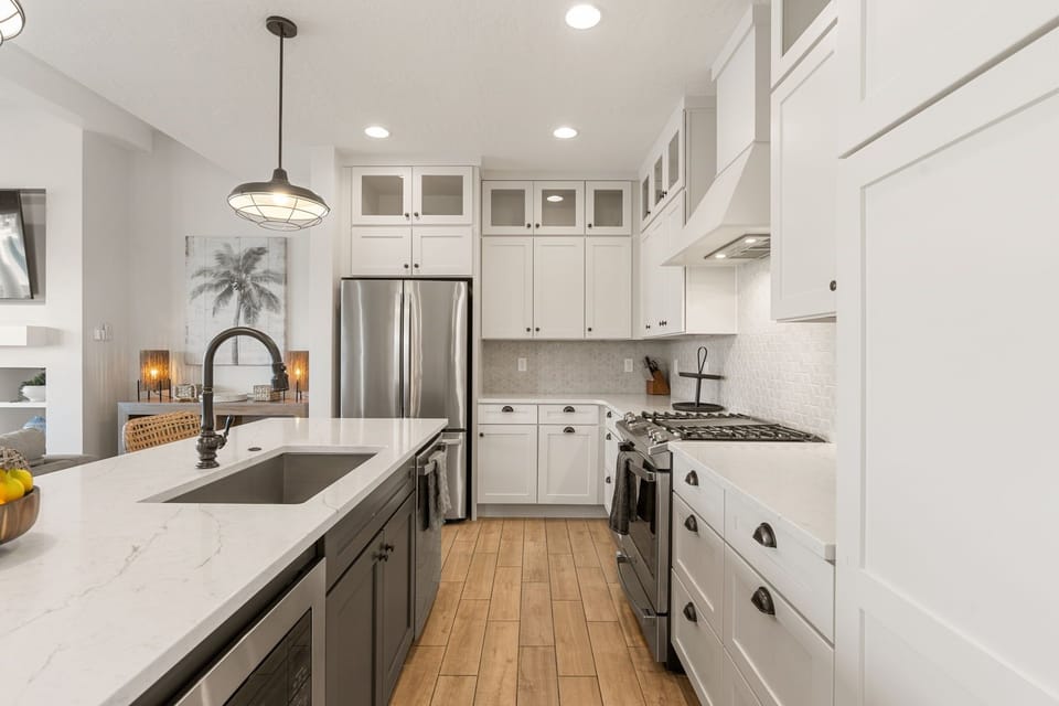 Townhome, 5 Bedrooms | Private kitchen | Fridge, oven, coffee/tea maker, toaster