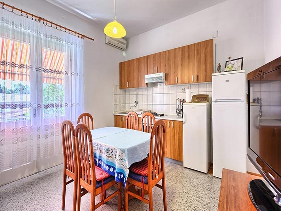 Apartment (Three Bedroom Apartment with Balcony) | Private kitchen | Fridge