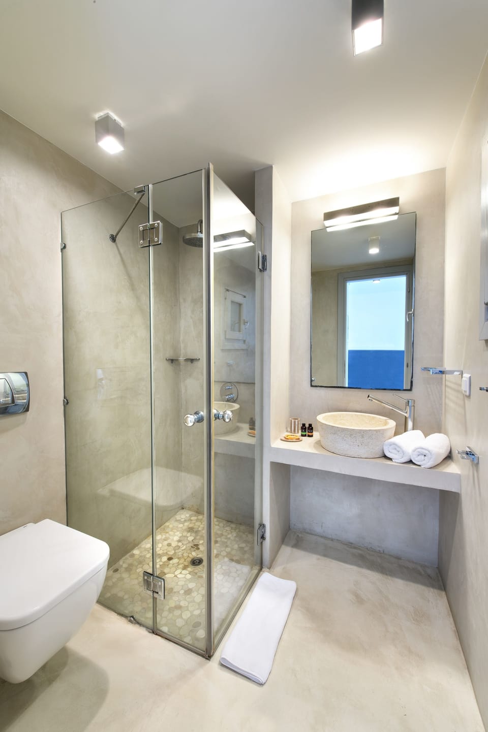 Shower, rainfall showerhead, designer toiletries, hair dryer