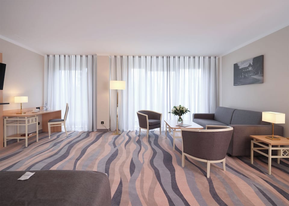 Junior Suite (Located to the Sea Side) | Hypo-allergenic bedding, in-room safe, individually furnished, desk