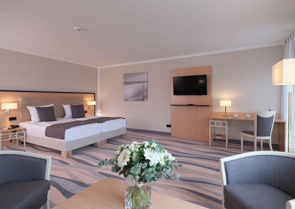 Junior Suite (Located to the Sea Side) | Hypo-allergenic bedding, in-room safe, individually furnished, desk
