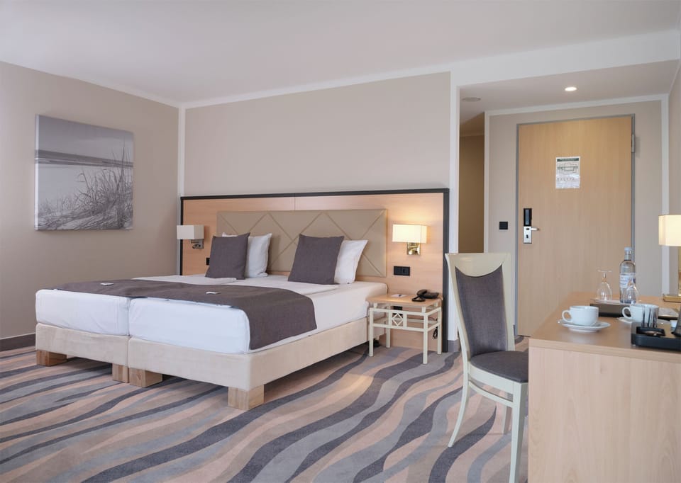 Junior Suite (Located to the Sea Side) | Hypo-allergenic bedding, in-room safe, individually furnished, desk