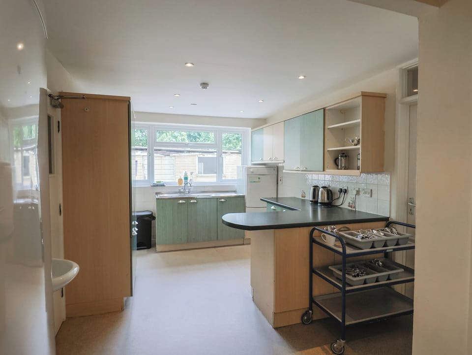 Fridge, microwave, dishwasher, cookware/dishes/utensils