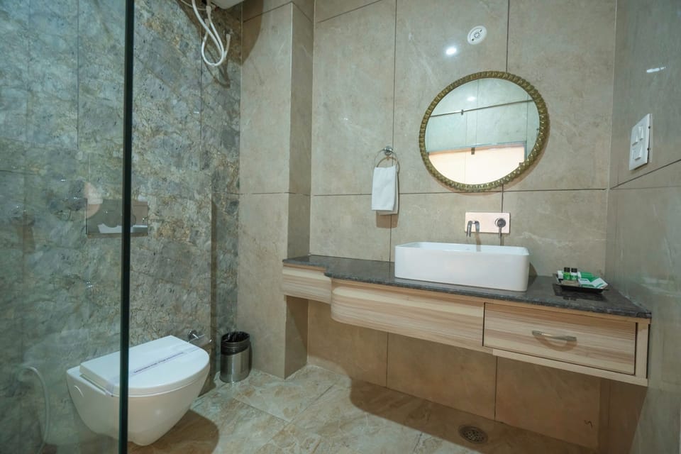 Shower, hair dryer, slippers, towels