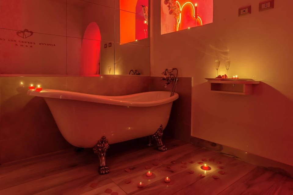 Suite | Bathroom | Separate tub and shower, rainfall showerhead, free toiletries