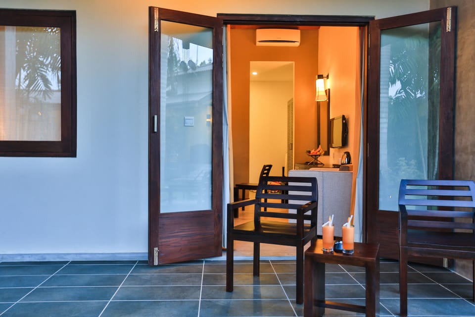 Deluxe Room | 1 bedroom, minibar, in-room safe, desk
