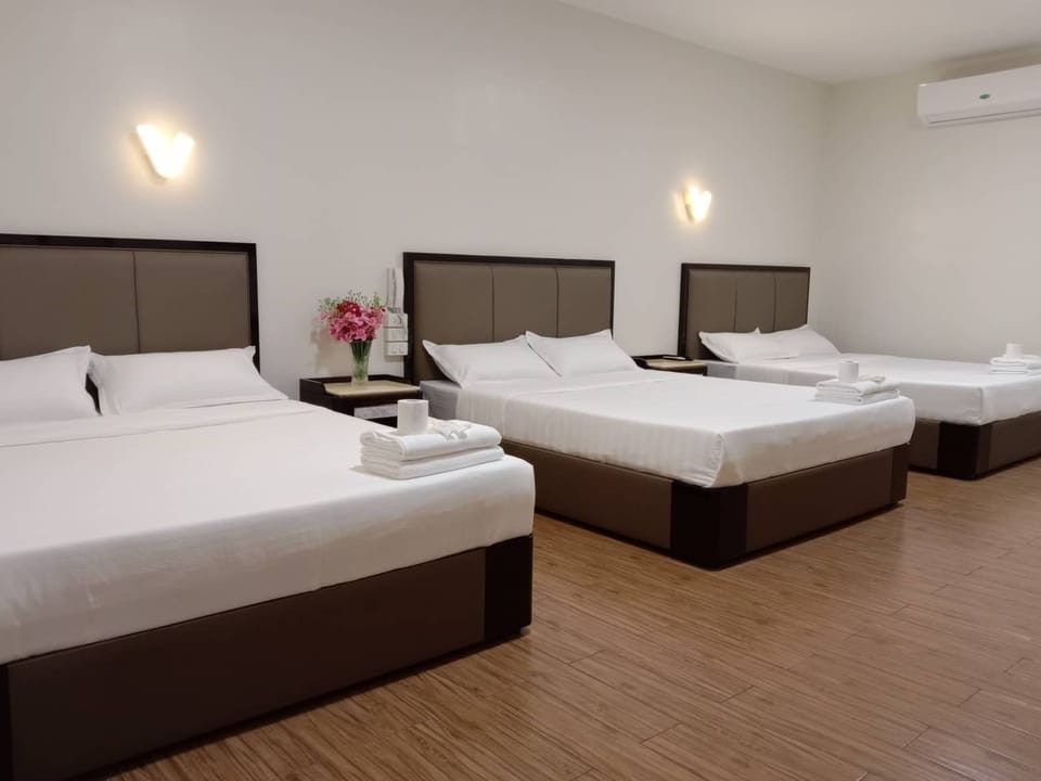 Family Triple Room | Desk, laptop workspace, free WiFi, bed sheets