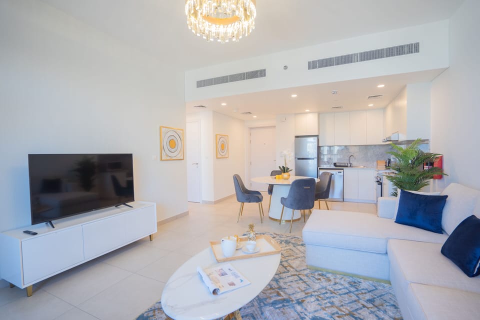 Comfort Apartment | Living area | 55-inch flat-screen TV with cable channels, TV