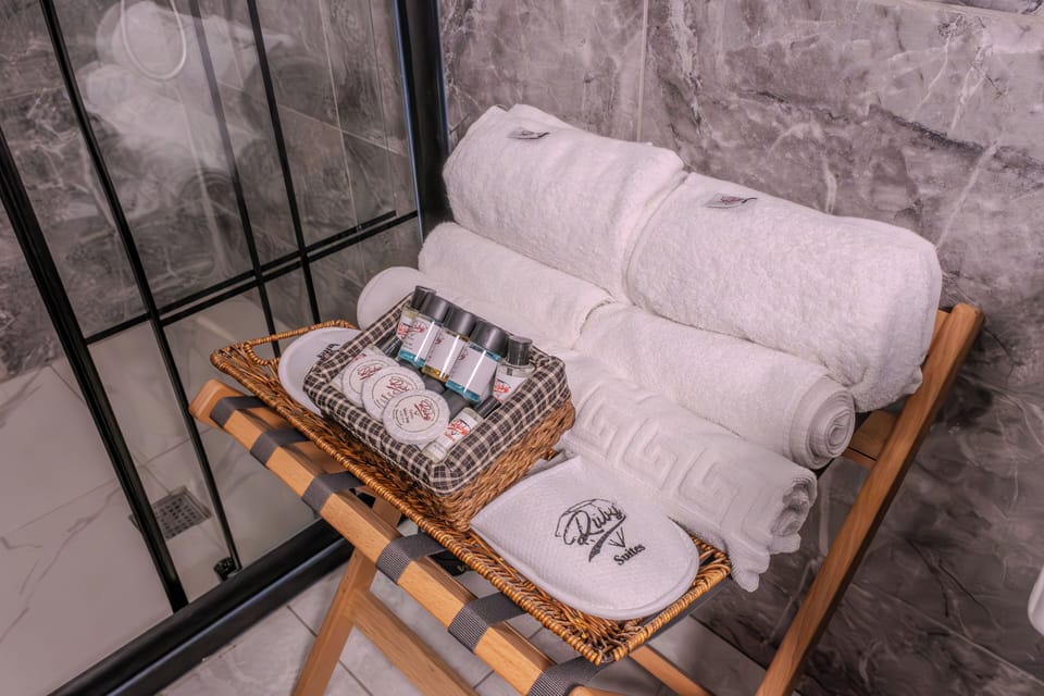 Shower, free toiletries, hair dryer, slippers
