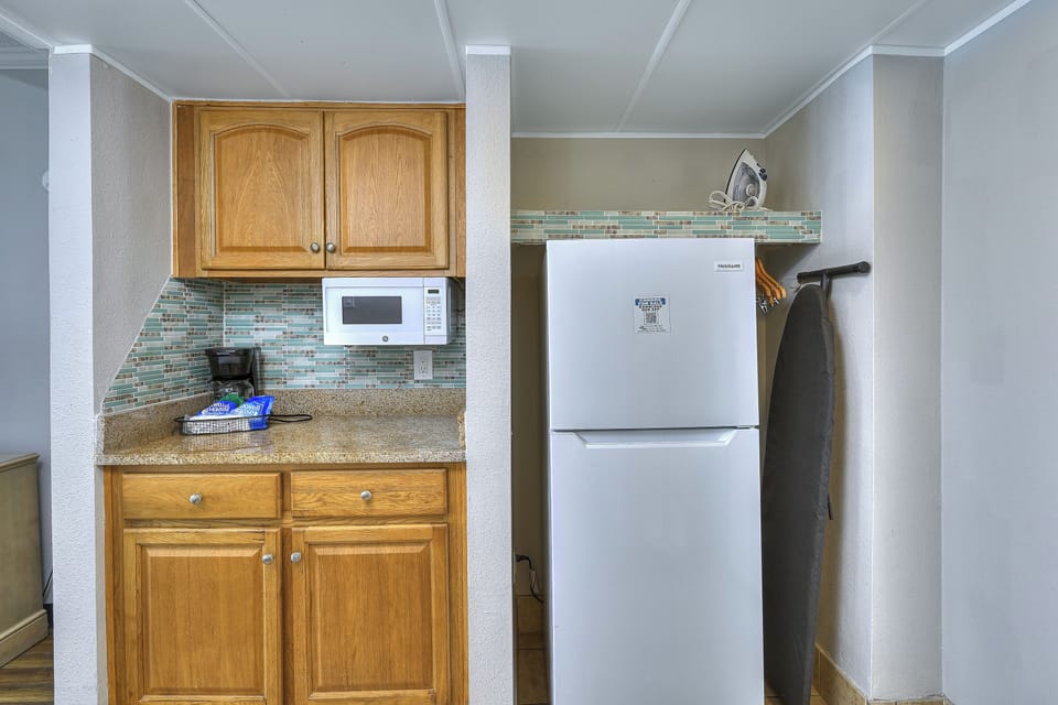 Studio, Pool Access, Oceanfront (1412) | Private kitchenette | Microwave, coffee/tea maker, toaster, cleaning supplies