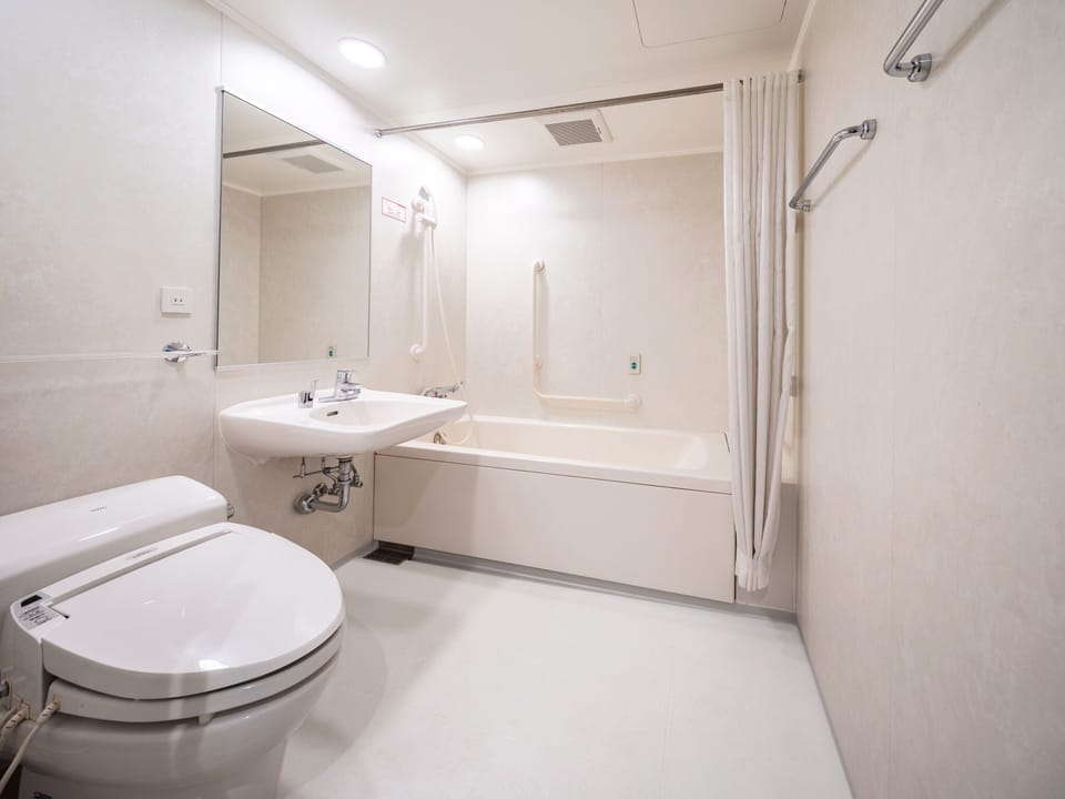 Double Room, Non Smoking | Bathroom | Combined shower/tub, free toiletries, hair dryer, bathrobes