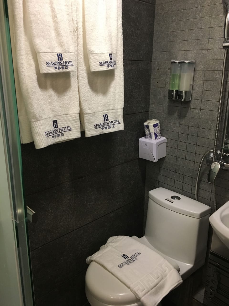 Shower, free toiletries, hair dryer, slippers