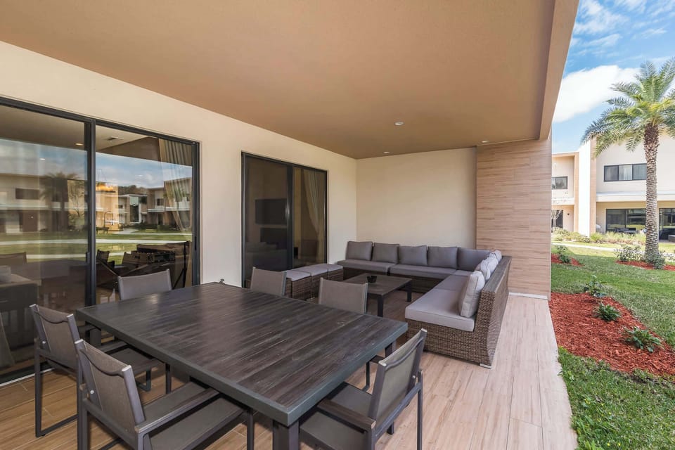 Townhome, Multiple Beds, Pool Access, City View (Villa at Magic Village) | Outdoor dining