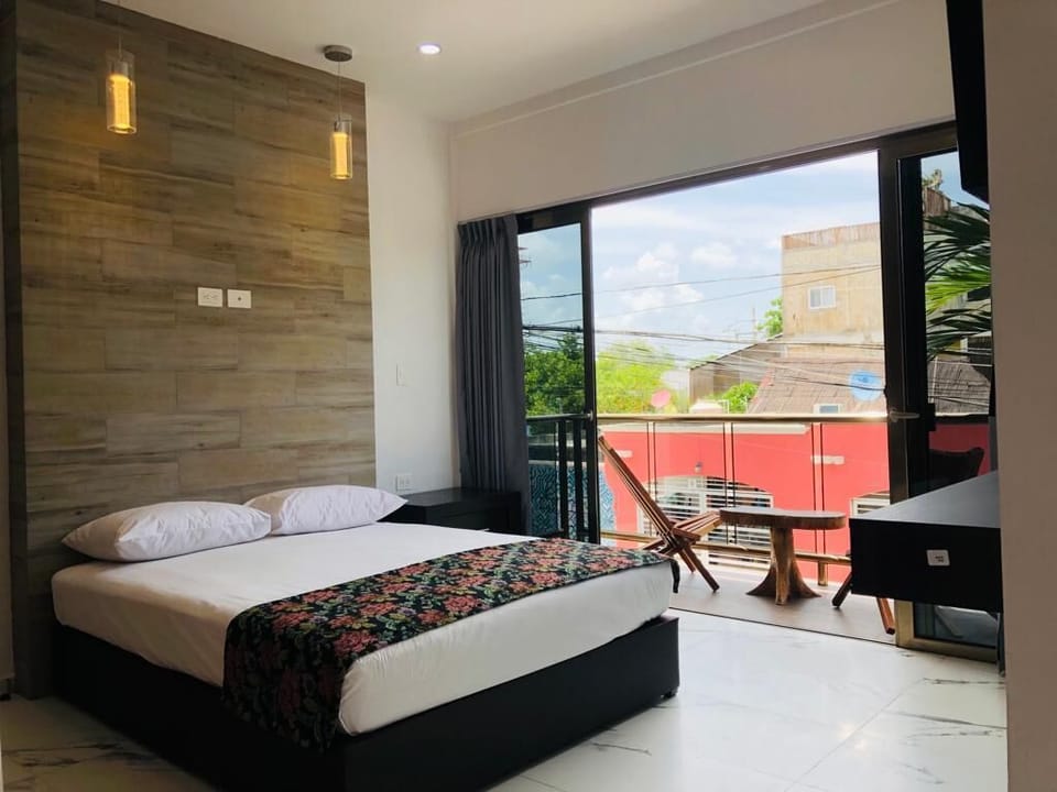 Standard Double Room | Minibar, in-room safe, desk, laptop workspace