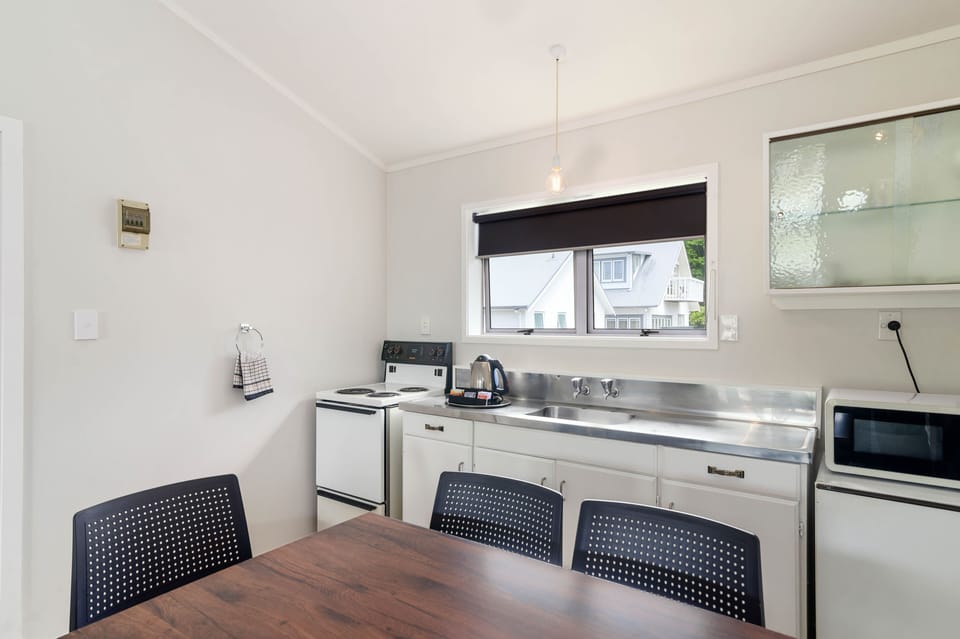 One Bedroom Unit (K) | Private kitchen | Fridge, microwave, stovetop, coffee/tea maker