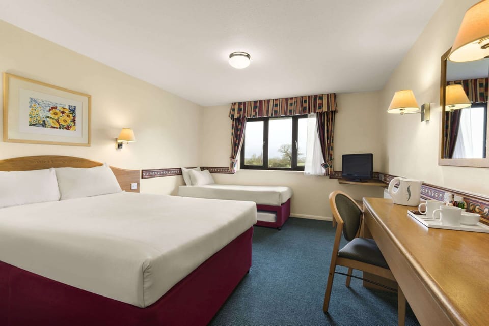 Family Room, Multiple Beds, Non Smoking | Desk, iron/ironing board (on request), WiFi (free), bed sheets
