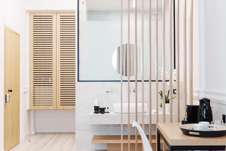 Poseidon Suites | Bathroom | Shower, rainfall showerhead, eco-friendly toiletries, hair dryer