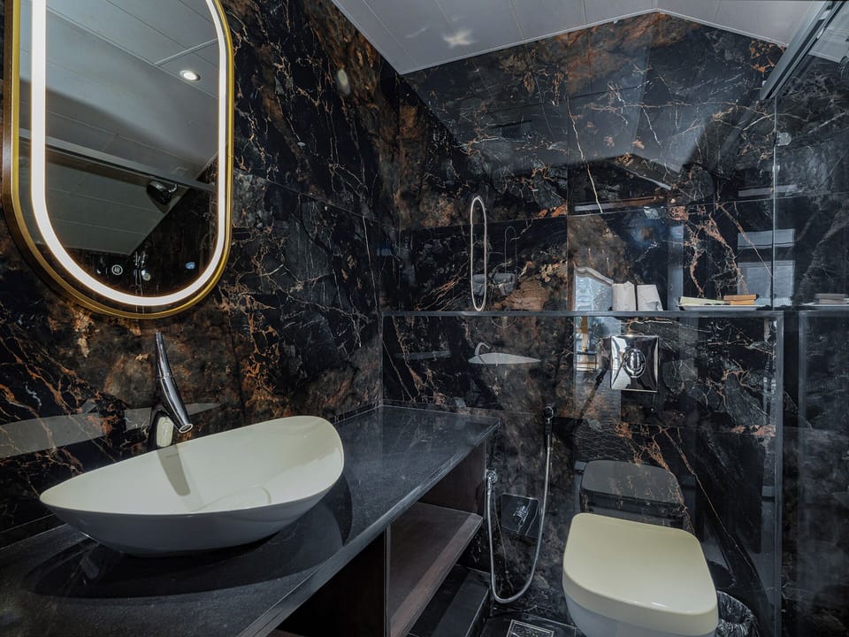 Luxury Room, Mountain View | Bathroom | Shower, rainfall showerhead, designer toiletries, hair dryer