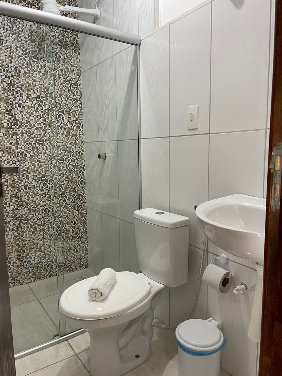 Shower, rainfall showerhead, towels, soap