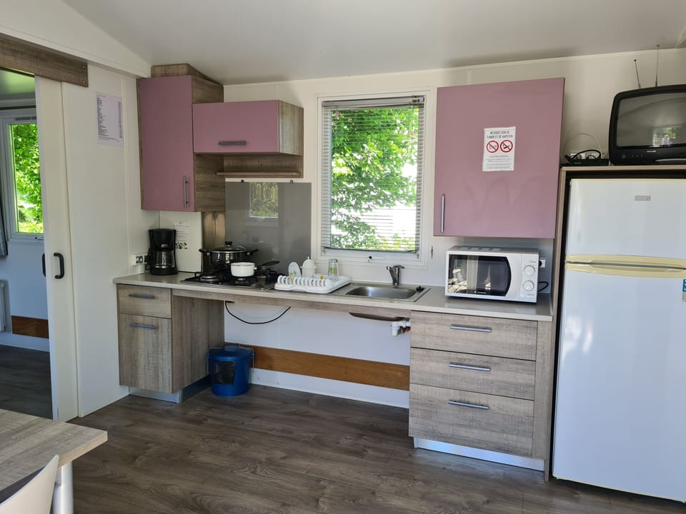 Classic Mobile Home, 2 Bedrooms | Blackout drapes, free WiFi